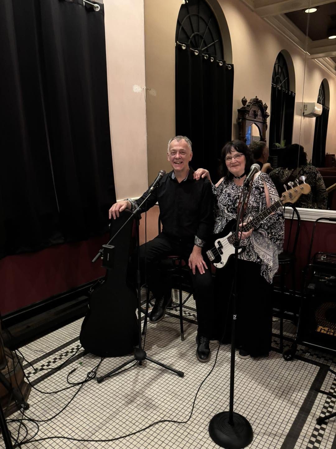 A duo performing live in the parlour